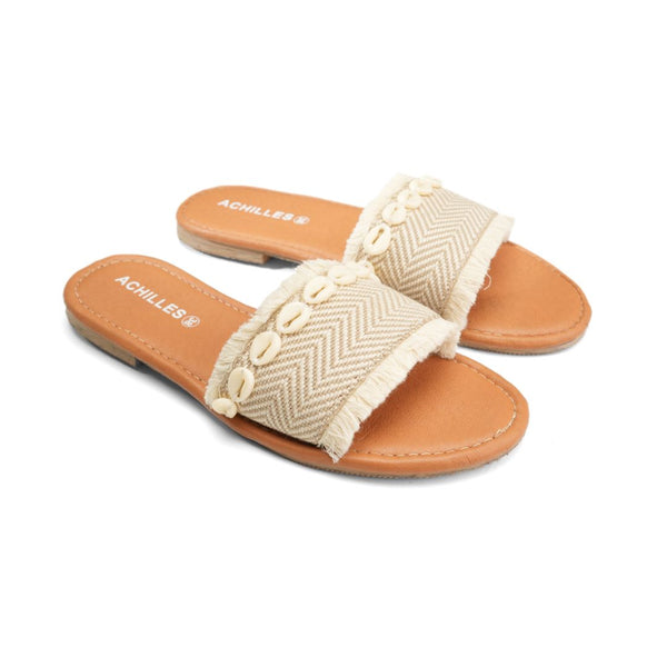 Sandshell |Walk on the beach with Sandshell slippers, adorned with tiny seashells for a touch of coastal elegance.